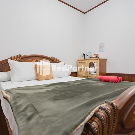 Langkar Guest House Syariah Mitra Reddoorz Самаринда Экстерьер фото