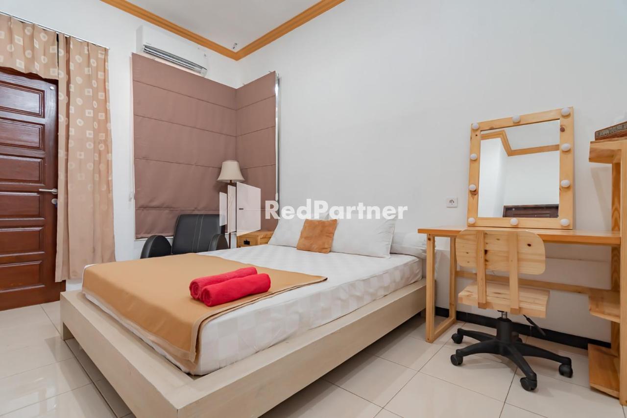 Langkar Guest House Syariah Mitra Reddoorz Самаринда Экстерьер фото