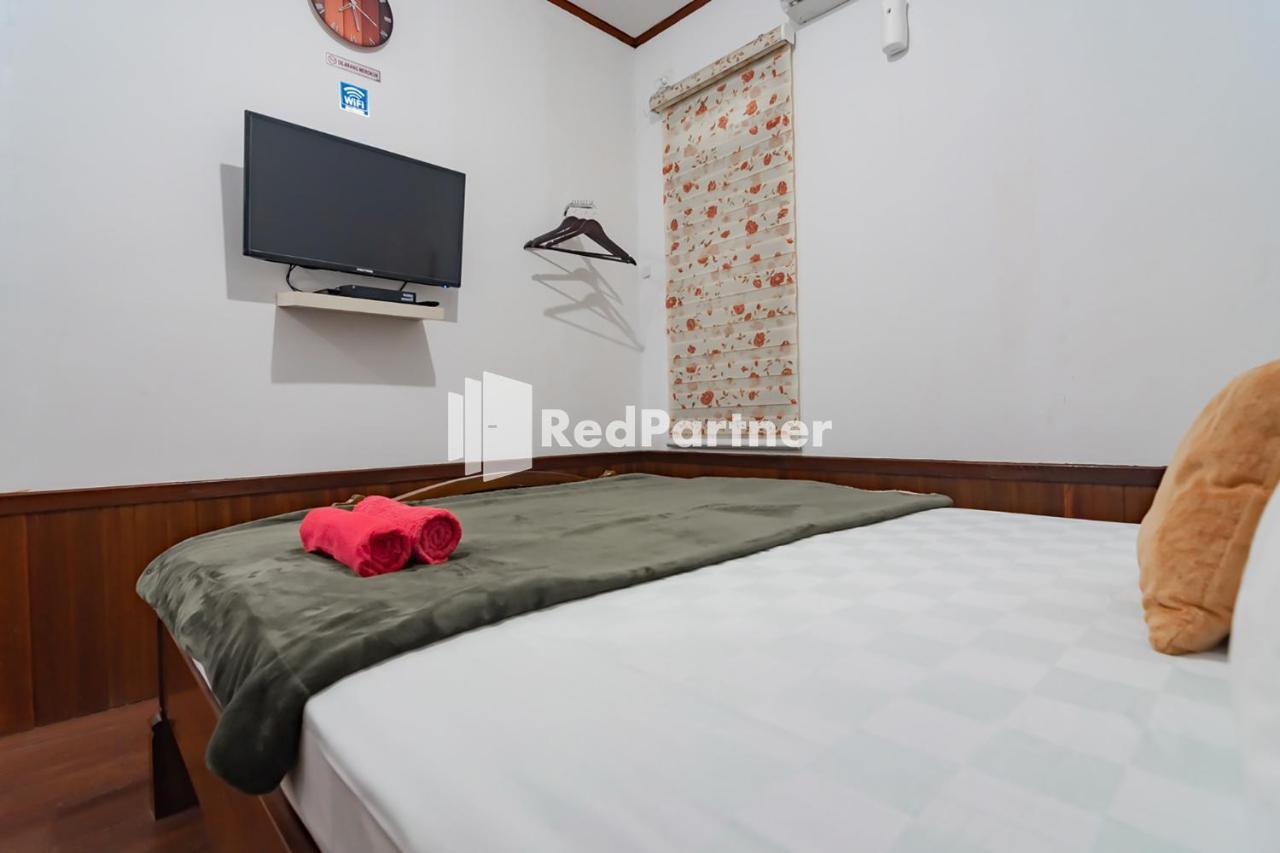 Langkar Guest House Syariah Mitra Reddoorz Самаринда Экстерьер фото