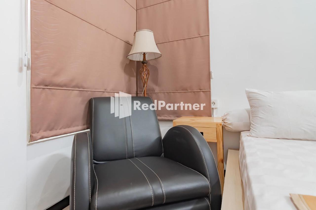 Langkar Guest House Syariah Mitra Reddoorz Самаринда Экстерьер фото