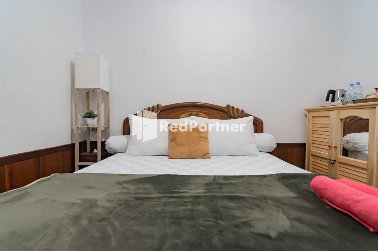 Langkar Guest House Syariah Mitra Reddoorz Самаринда Экстерьер фото