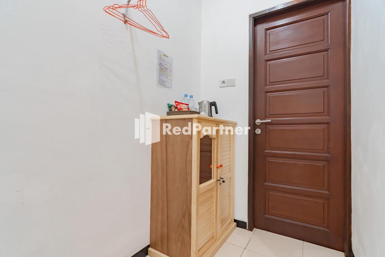 Langkar Guest House Syariah Mitra Reddoorz Самаринда Экстерьер фото