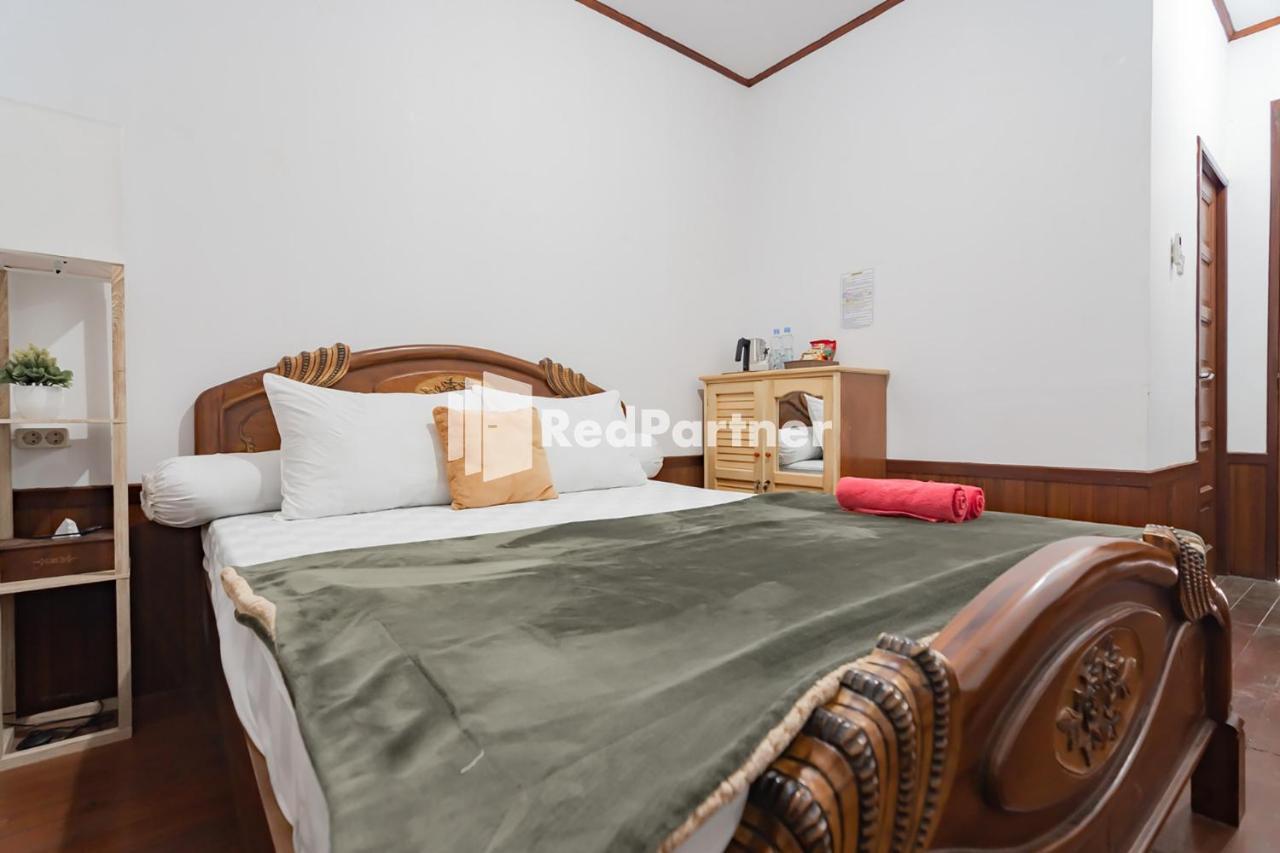 Langkar Guest House Syariah Mitra Reddoorz Самаринда Экстерьер фото