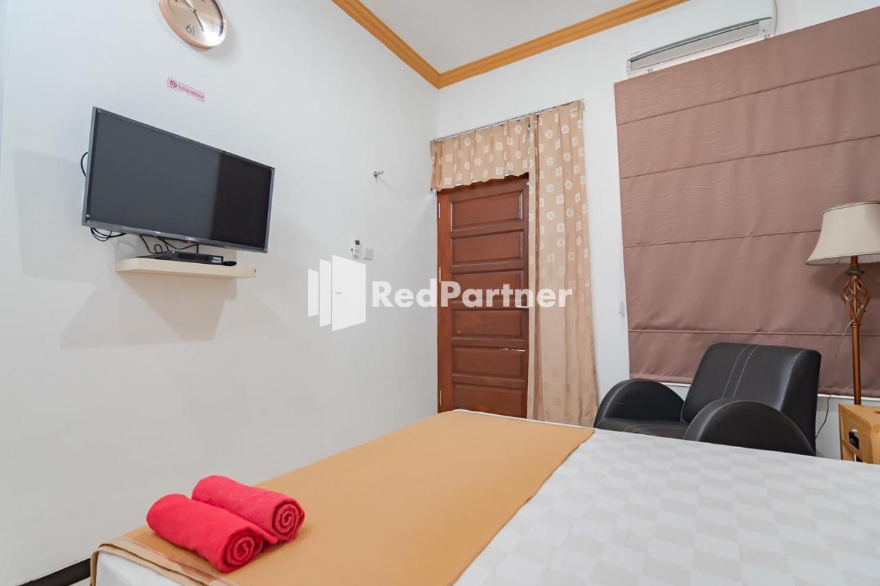Langkar Guest House Syariah Mitra Reddoorz Самаринда Экстерьер фото