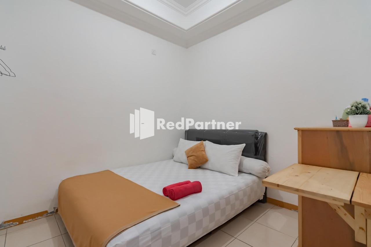 Langkar Guest House Syariah Mitra Reddoorz Самаринда Экстерьер фото