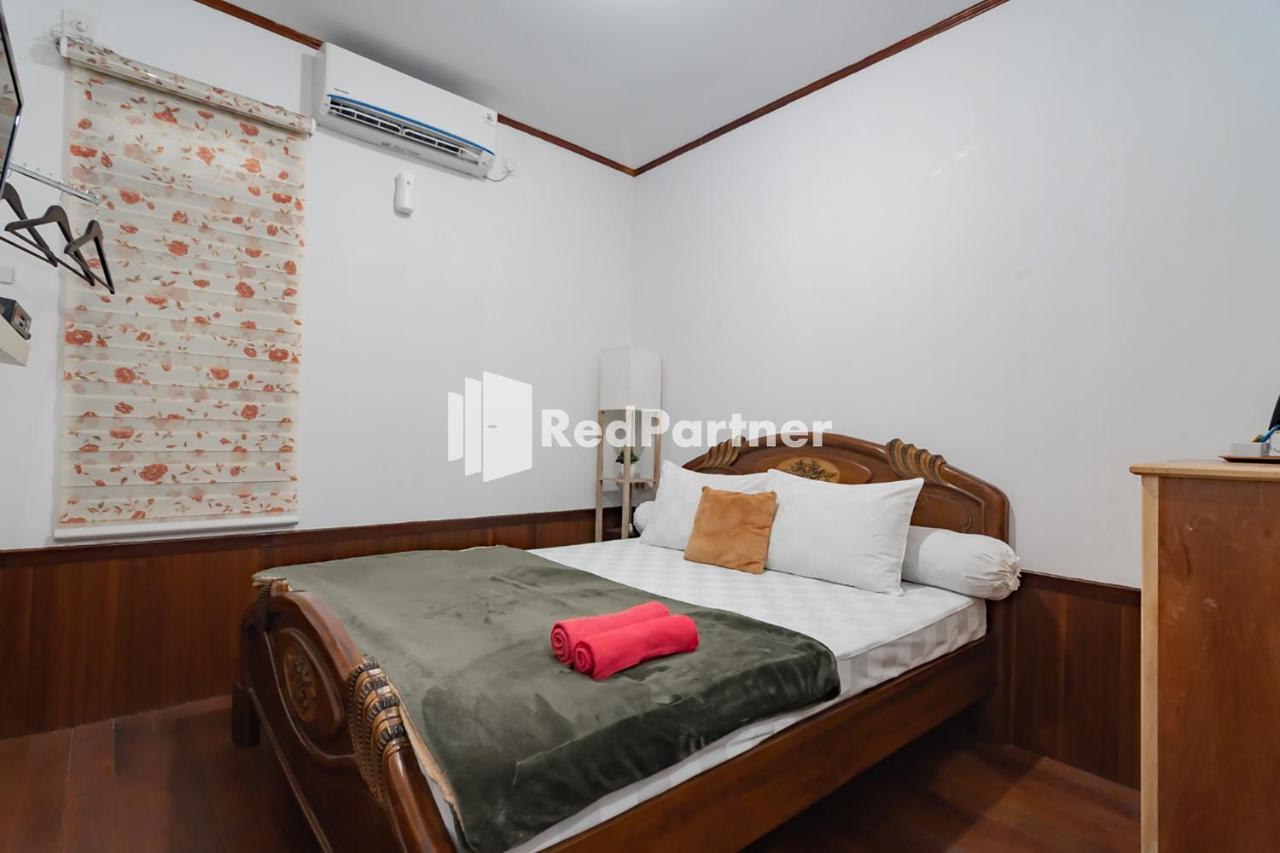 Langkar Guest House Syariah Mitra Reddoorz Самаринда Экстерьер фото